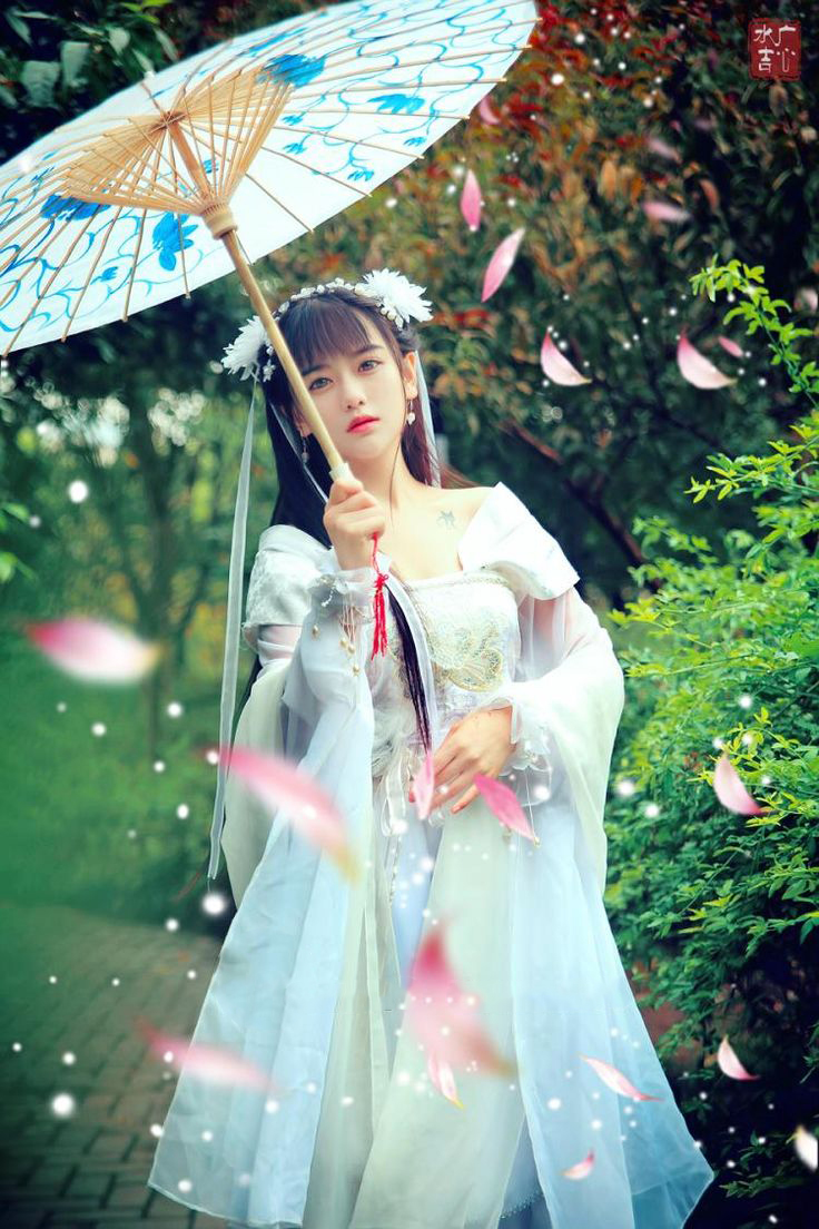 Model with blue Hanfu and blue umbrella